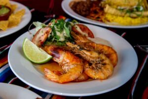 plate of king prawns and salad